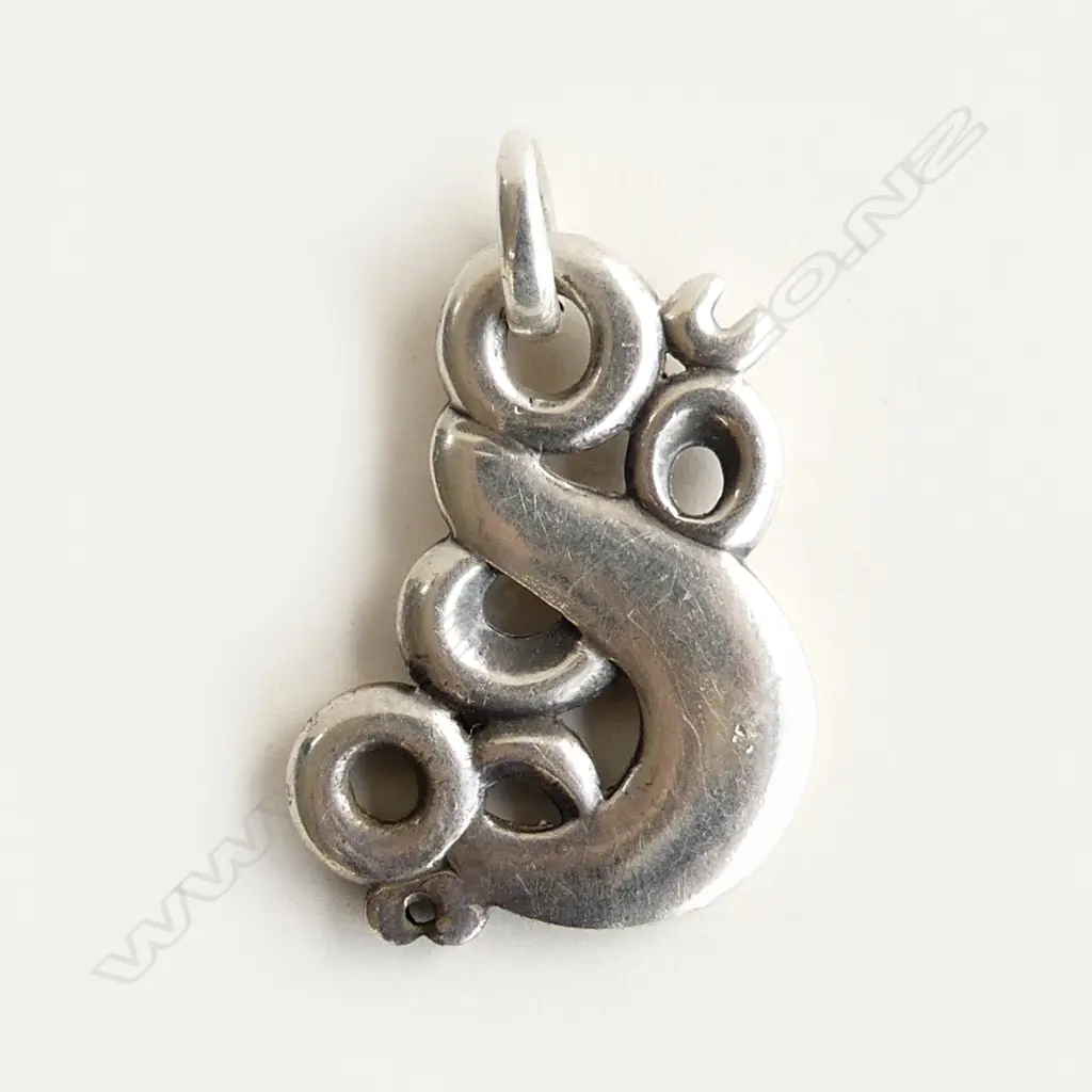 A cast silver handmade taniwha pendant, Image 1++